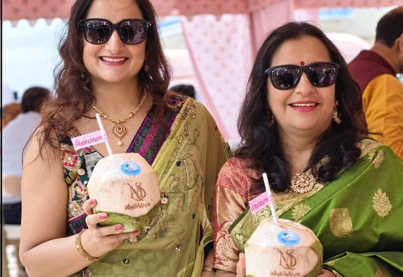 Customers enjoying fresh tender coconut water with custom branding